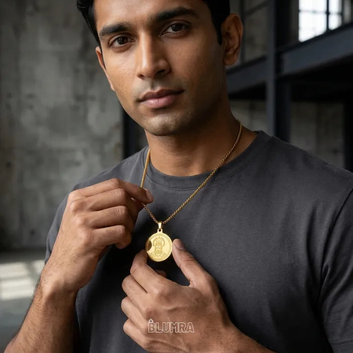 "Man wearing 24 inch Hanuman gold pendant chain"